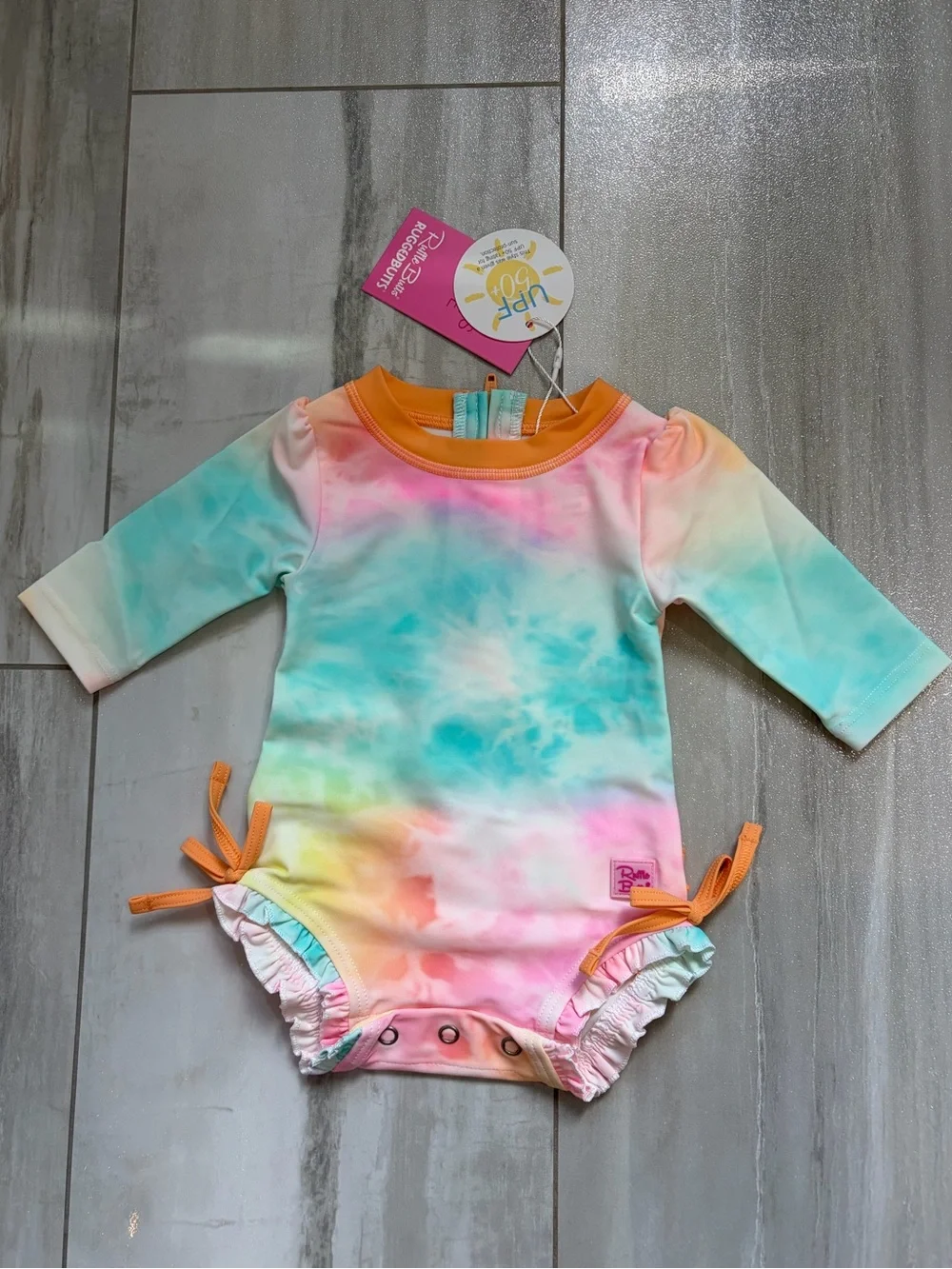 NWT RuffleButts Rainbow Tie Dye Long Sleeve Rash Guard One Piece Swimsuit, 0-3M